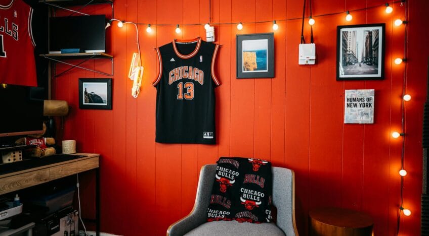 Cozy indoor space with Chicago Bulls memorabilia and vibrant red walls.